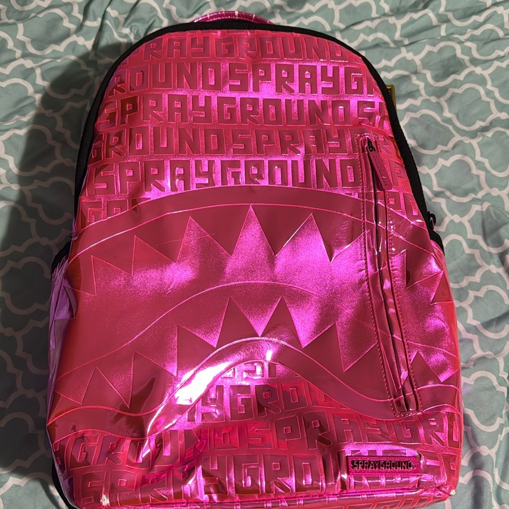 I am selling a hot pink sprayground backpack.